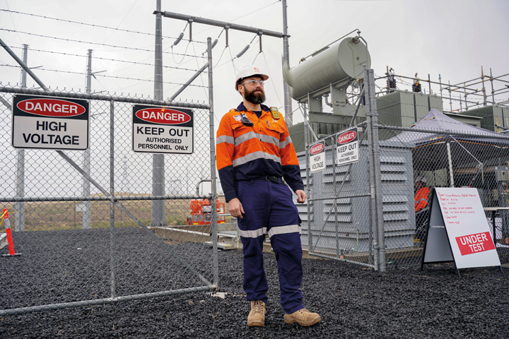 Origin Energy Senior High Voltage Engineer Nick Bristow at the substation which powers the Eurombah Creek Gas Field Facility.
